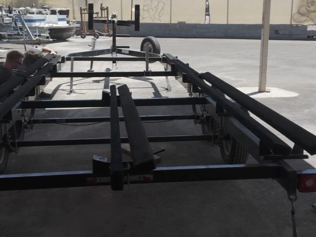 Pontoon trailer with new carpeted bunks installed